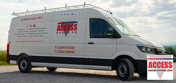 A white van with branding on it for Access Group UK. Red and grey writing with a key focus on 24 hour call out.
